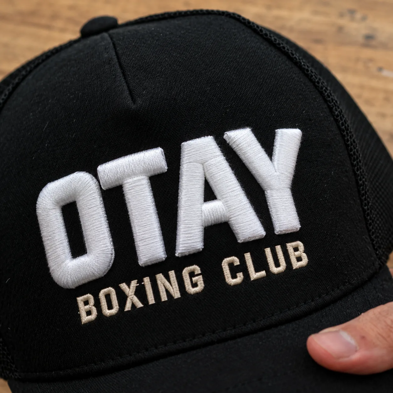 Example: an embroidered boxing club cap