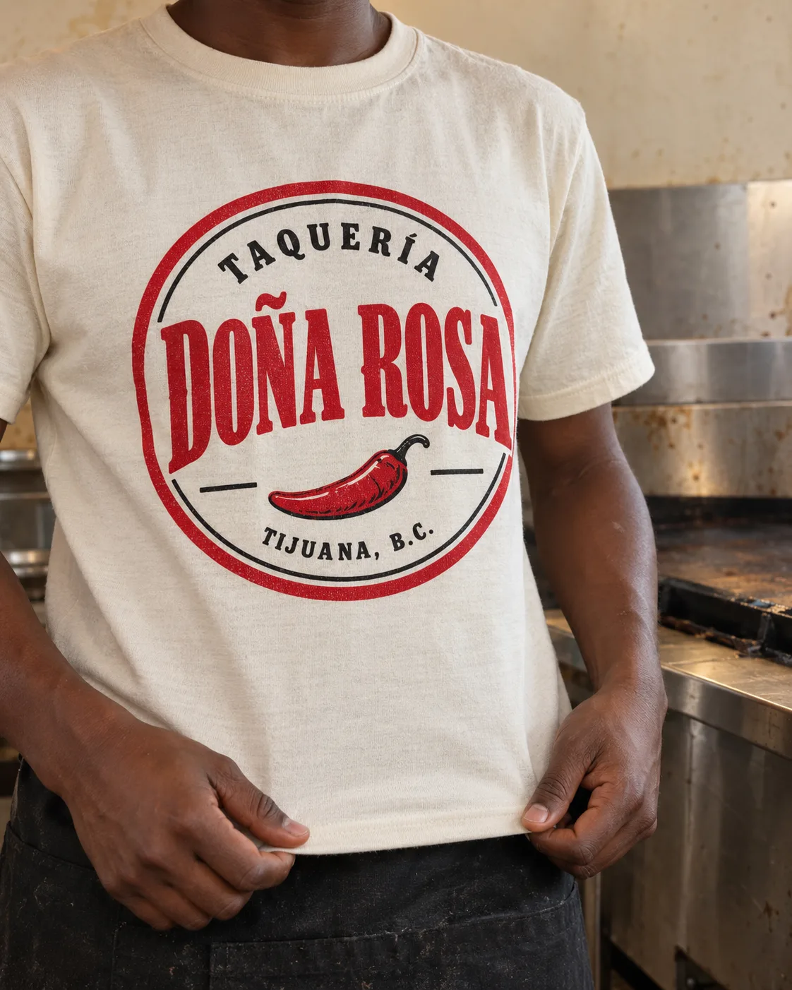 Example: a black T-shirt screen printed for a taco stand